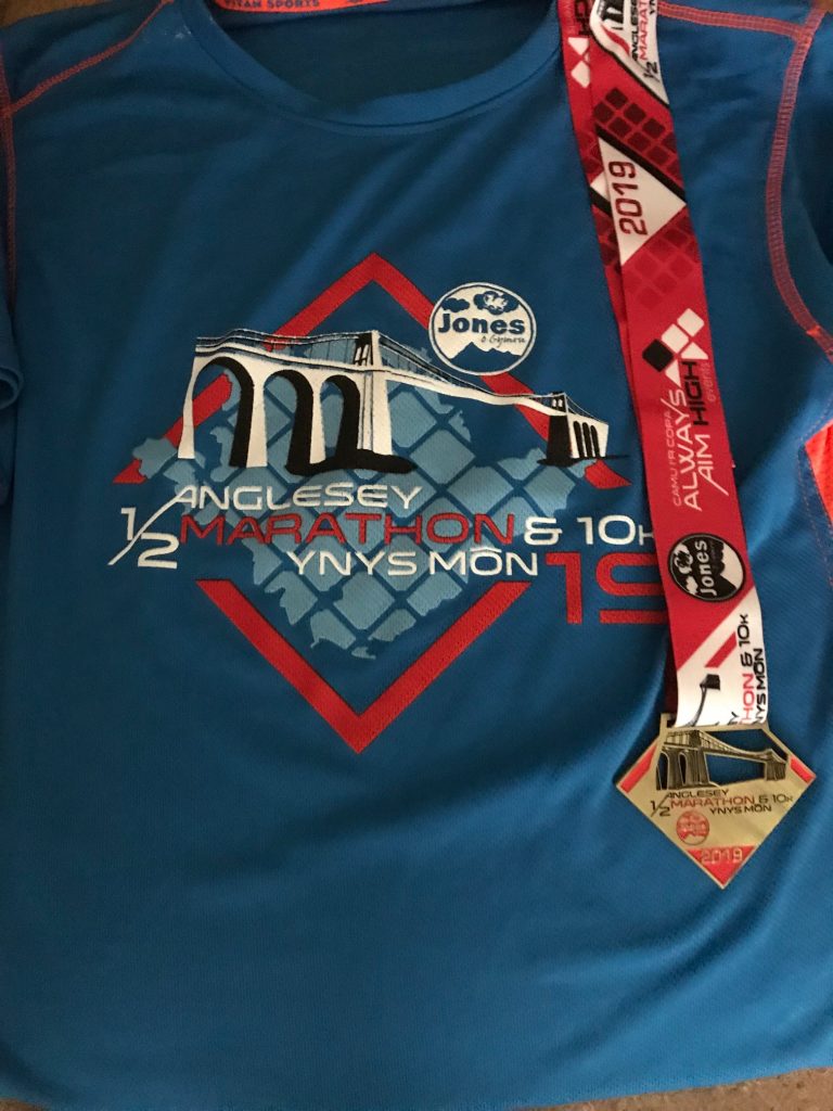 Anglesey Half Marathon 2019 tshirt and medal